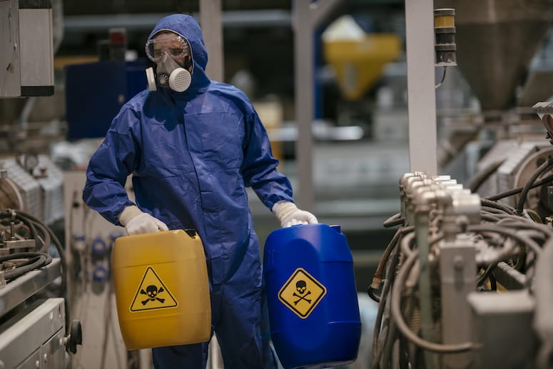 Worker Carrying PFAS chemicals